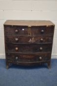 A DISTRESSED GEORGIAN BOWFRONT CHEST OF TWO OVER THREE LONG DRAWERS, mixed turned handles, on