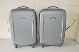 A PAIR OF REVELATION SUITCASES 56cm high