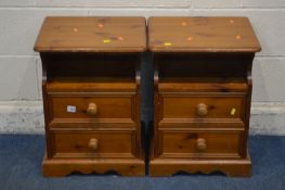 A PAIR OF PINE BEDSIDE CABINETS