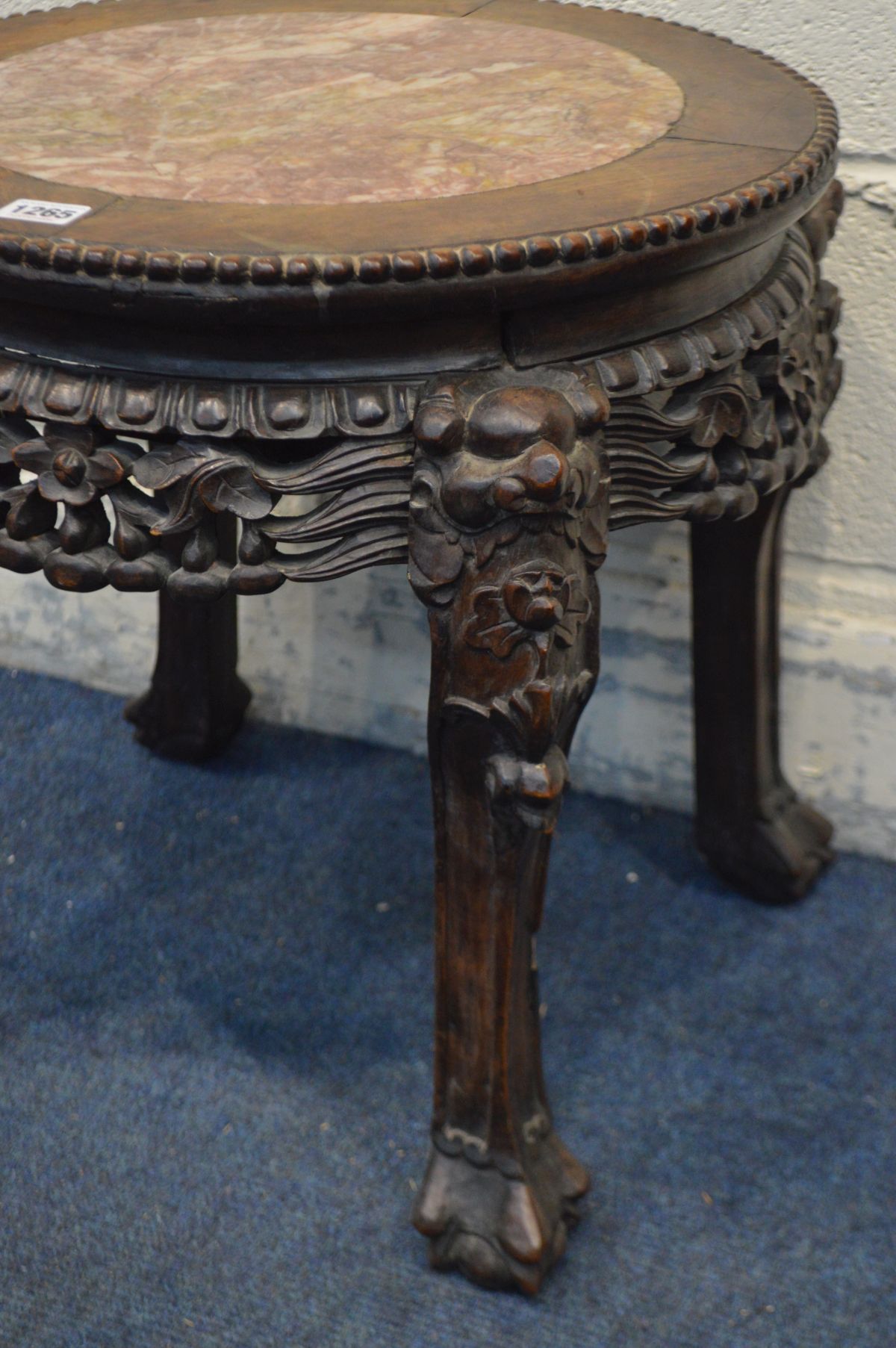 AN ORIENTAL ROSEWOOD OCCASIONAL TABLE with a pink marble insert, and elaborate carving, diameter - Image 3 of 3
