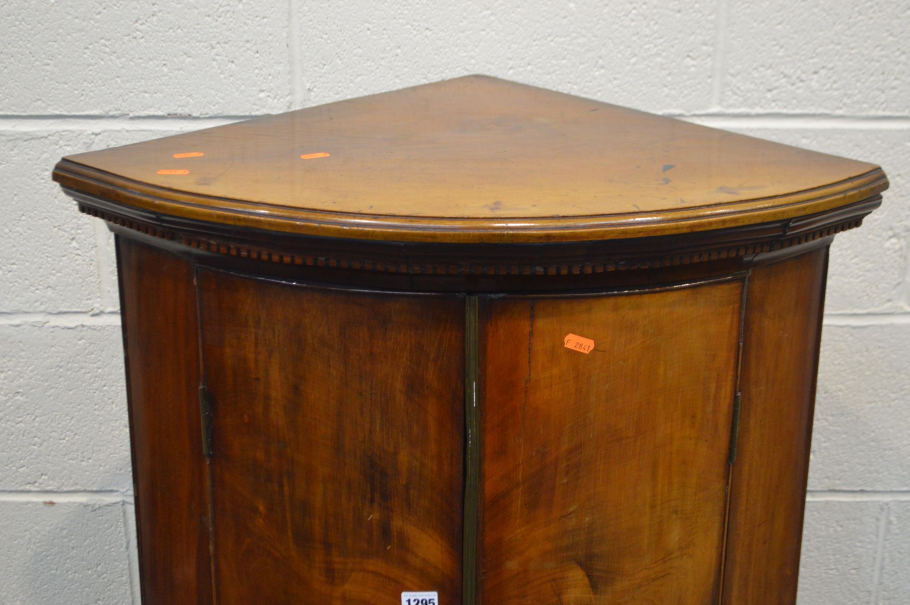 A GEORGIAN STYLE FLAME MAHOGANY BOW FRONT TWO DOOR CORNER CUPBOARD, incorporating older veneers, - Image 2 of 3