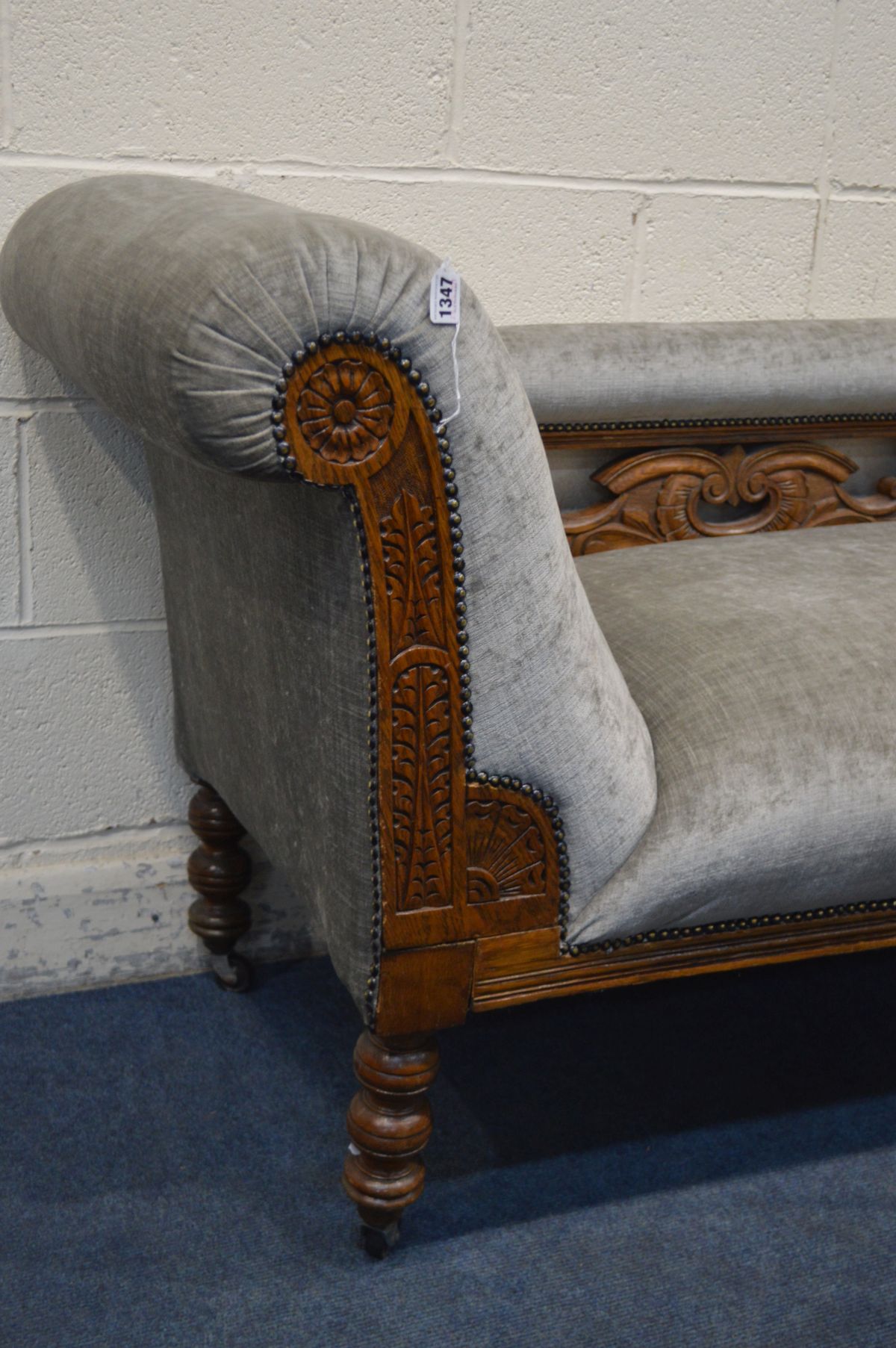 A EDWARDIAN CARVED OAK CHAISE LONGUE, reupholstered in grey, length 177cm - Image 3 of 4