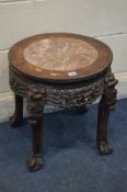 AN ORIENTAL ROSEWOOD OCCASIONAL TABLE with a pink marble insert, and elaborate carving, diameter