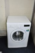 A WHIRLPOOL WWDC9440 WASHING MACHINE (PAT pass and powers up)