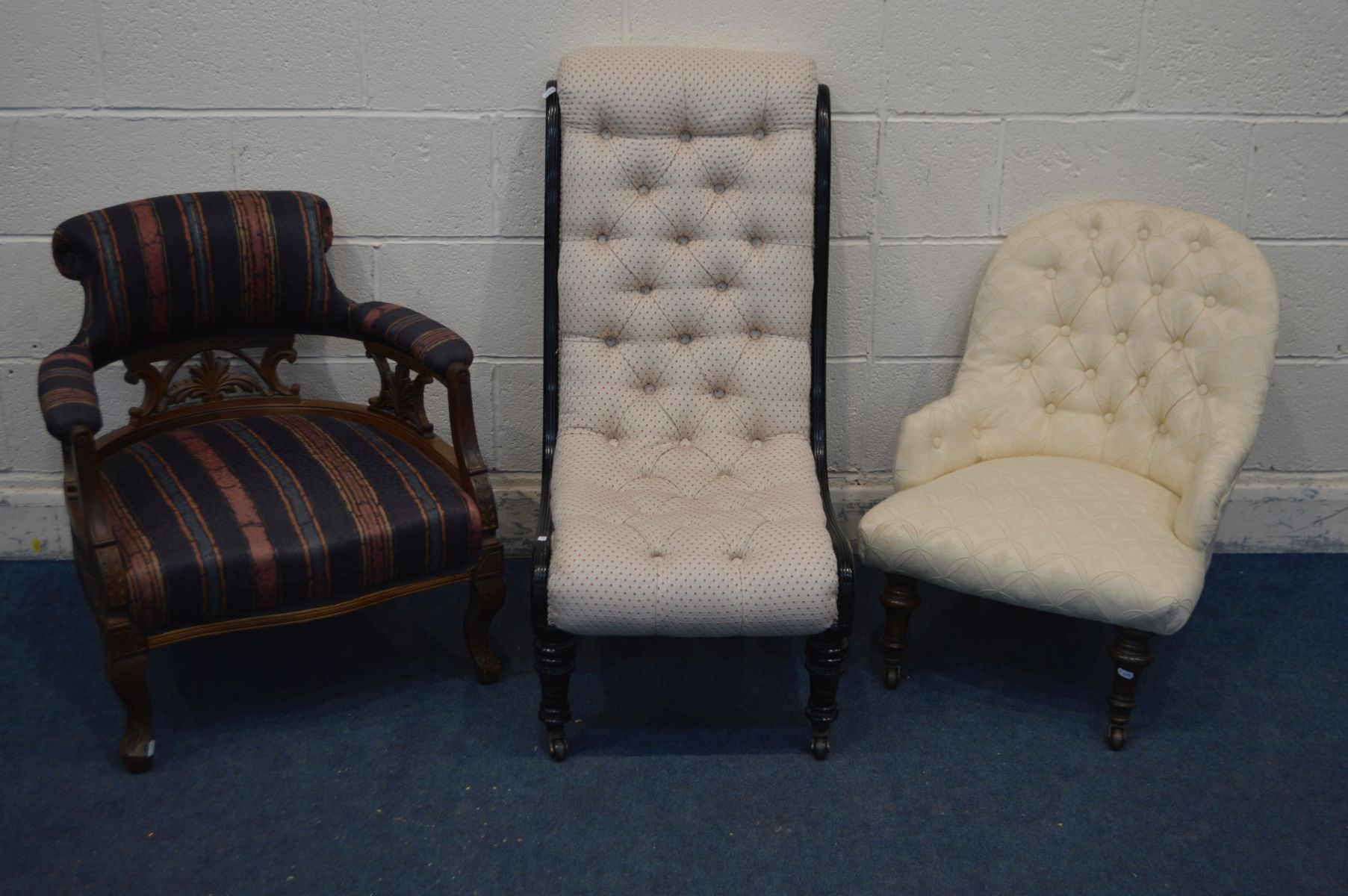 AN EDWARDIAN EBONISED SCROLLED CHAIR, along with an Edwardian mahogany tub chair and another