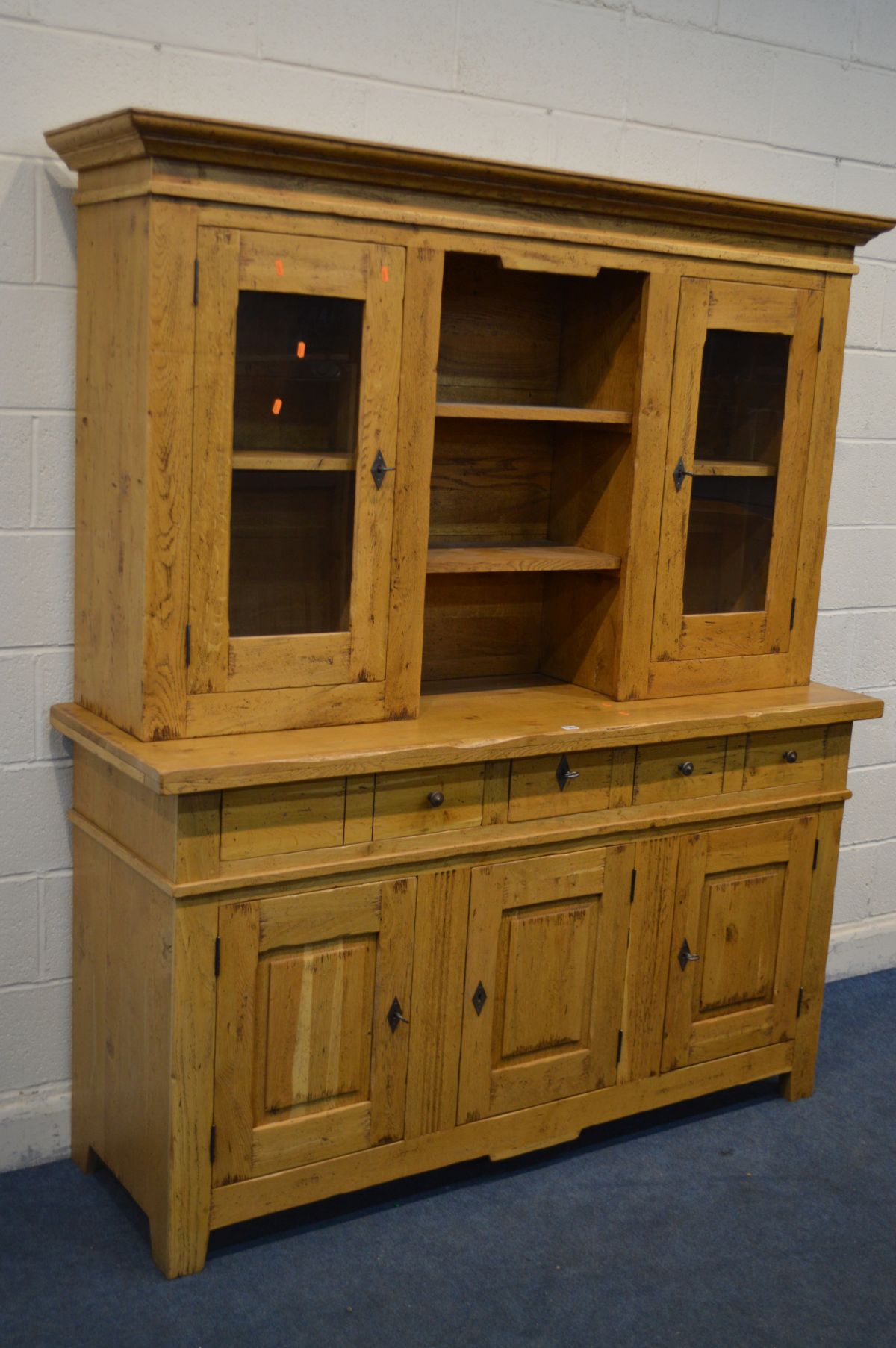 A GOLDEN OAK DRESSER, the top with double glazed doors flanking open shelves, above a base with - Image 2 of 4