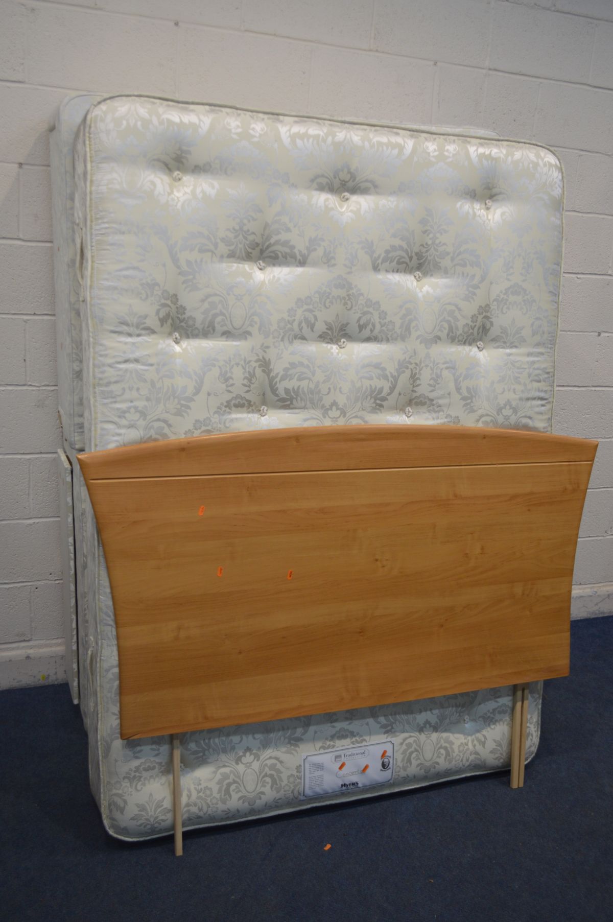 A MYERS 4FT6 DIVAN BED, with four drawers, mattress, and a beech finish headboard (Sd to headboard)