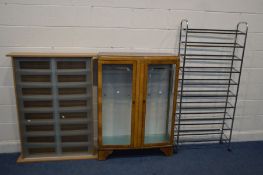 AN ART DECO WALNUT DOUBLE DOOR CHINA CABINET, along with a modern beech frosted glass double door