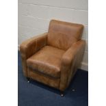 A TAN LEATHER CLUB CHAIR, with fire labels