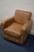 A TAN LEATHER CLUB CHAIR, with fire labels