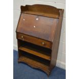 A SLIM OAK BUREAU, with a single drawer, width 76cm x depth 38cm x height 124cm