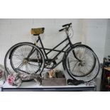 A VINTAGE HOPPER ANS SONS LADIES BIKE and a vintage Gents racing bike in parts with a tray of