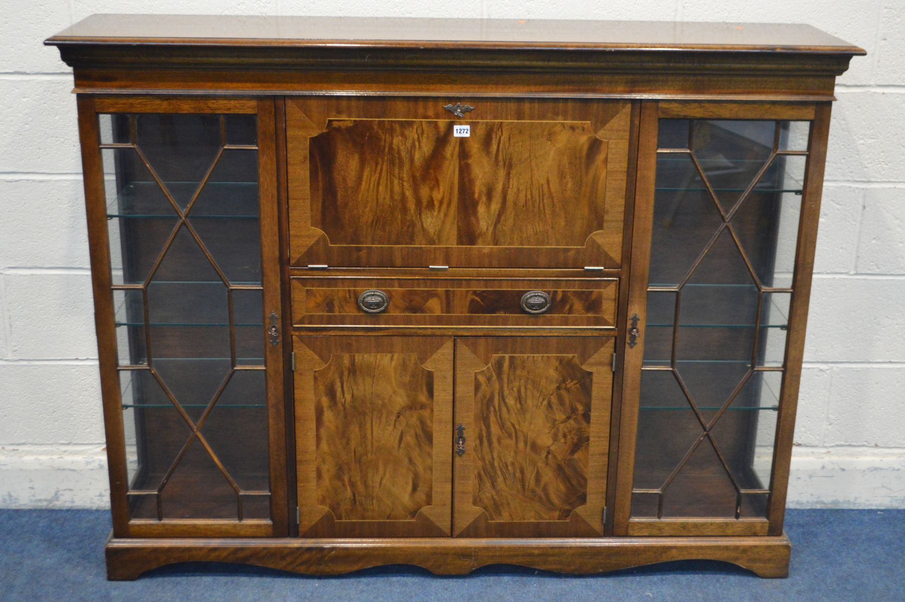 A MAHOGANY SIDE BY SIDE DISPLAY/DRINKS CABINET, with two single doors flanking a fall front section,