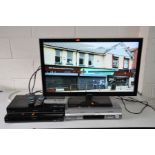 A FOUR ITEMS OF PANASONIC VISUAL EQUIPMENT including a TX-L32E5B 32ins LCD TV with remote, a DMR-