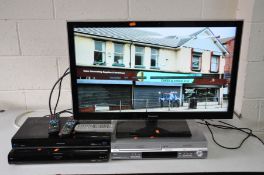 A FOUR ITEMS OF PANASONIC VISUAL EQUIPMENT including a TX-L32E5B 32ins LCD TV with remote, a DMR-