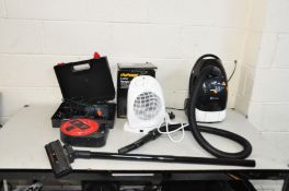 A RUSSEL HOBBS POWER CLEAN 1800 VACUUM CLEANER, a Challenge Heater, a Plasplugs extension reel and a