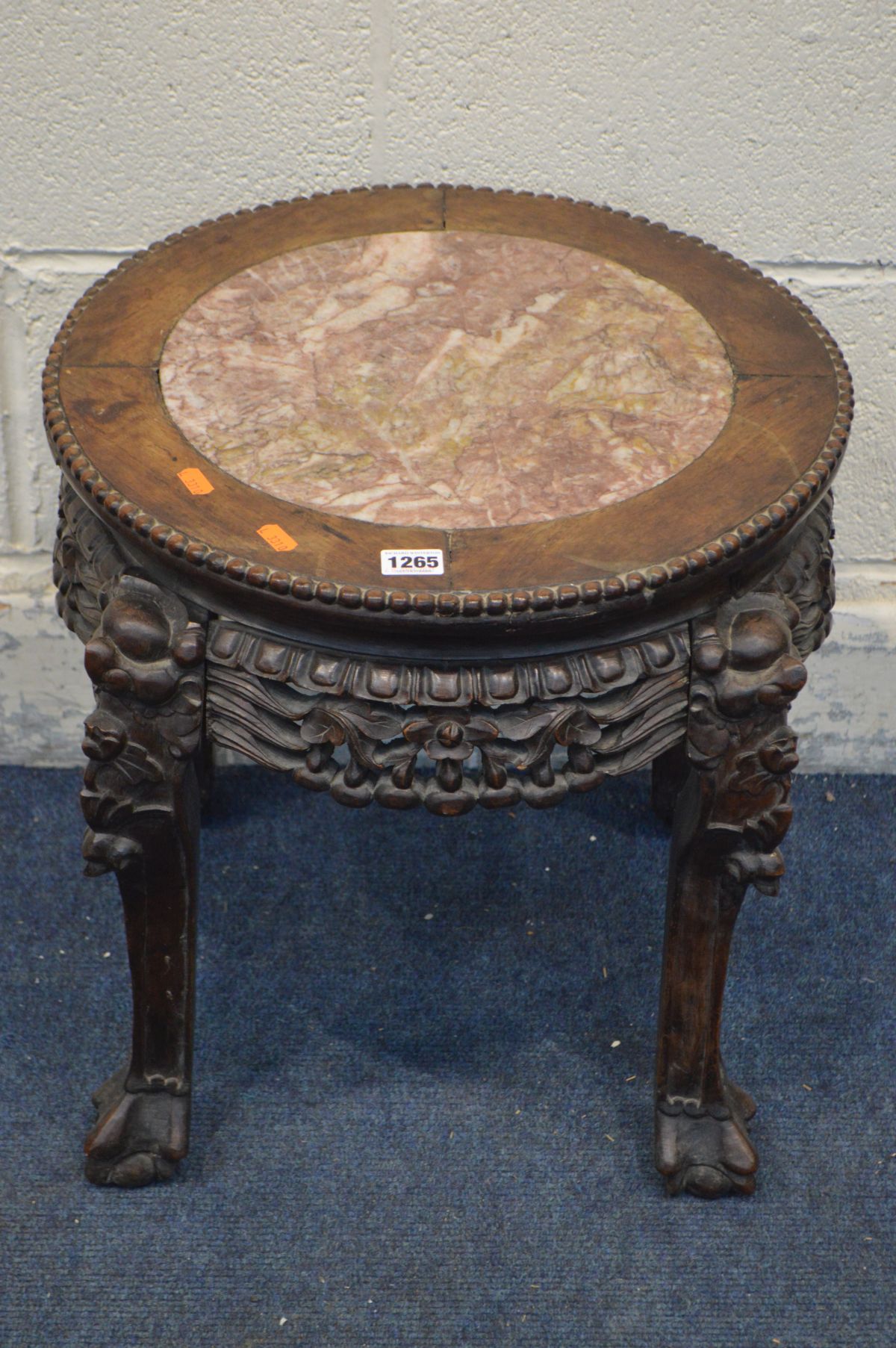 AN ORIENTAL ROSEWOOD OCCASIONAL TABLE with a pink marble insert, and elaborate carving, diameter - Image 2 of 3