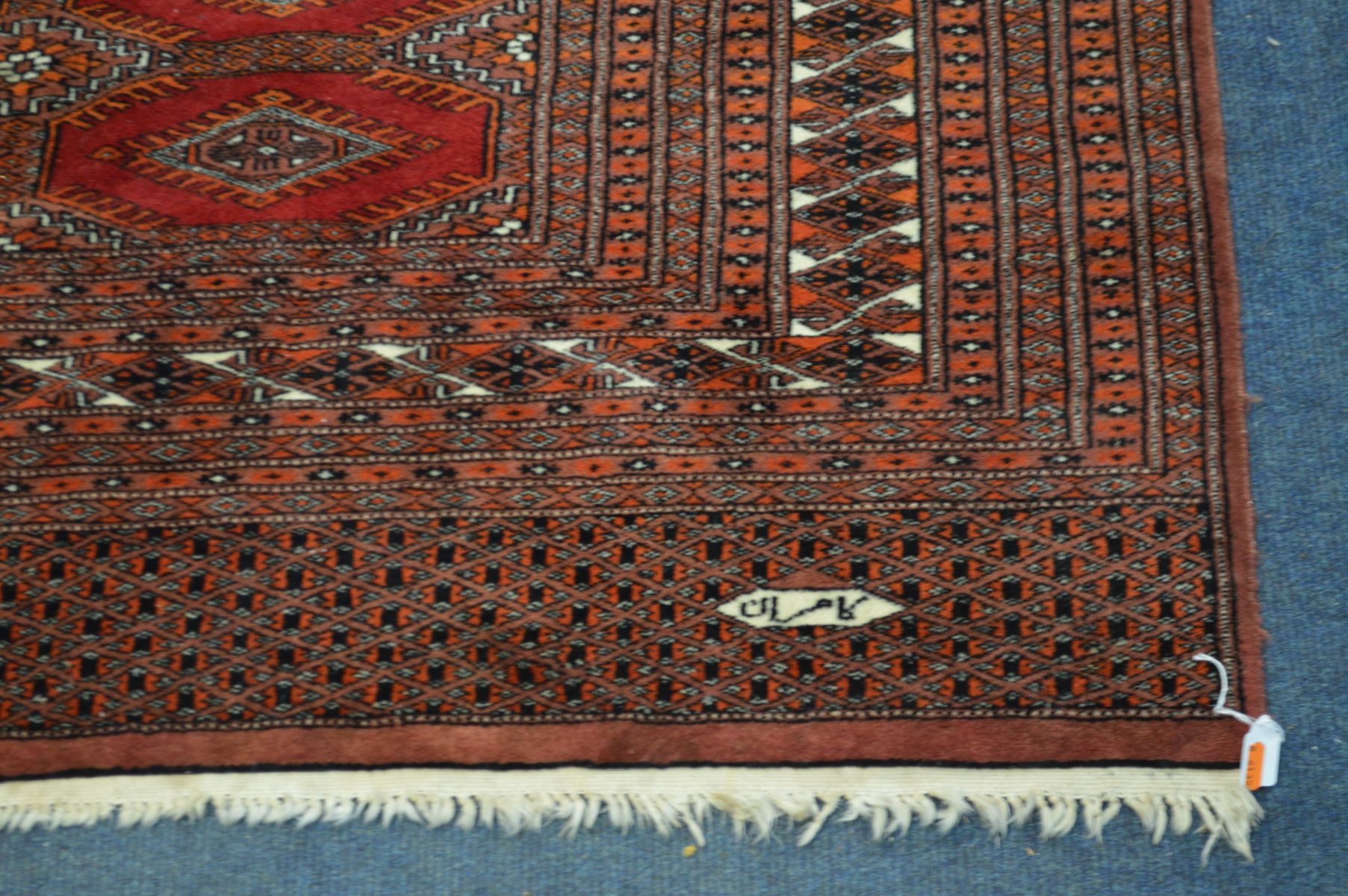 A TEKKE BOKHARA RED GROUND RUG, 320cm x 250cm (Sd to tassels) - Image 3 of 5