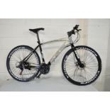 A BRAND NEW EXTREME XRR1 CAMANCHO ROAD BIKE with 21 speed Shimano gears, front and rear disc brakes,