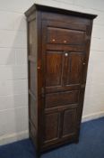 AN OAK PANELLED SINGLE DOOR HALL ROBE, incorporating older timbers, width 82cm x depth 50cm x height