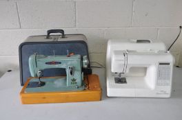 A JANOME XC 33 SPECIAL EDITION SEWING MACHINE (no pedal or power cables so untested) and a