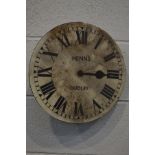 A PAINTED 12INCH CLOCK DIAL with roman numerals and single fusee movement (distressed)