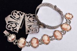 AN EARLY EDWARDIAN SILVER BUCKLE, A SILVER BANGLE AND A BRACELET, the buckle of an openwork floral