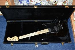 A STRAT TYPE GUITAR, in black and maple, two piece neck and fingerboard with Fender USA 1984 decals,