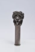 A LATE VICTORIAN SILVER PARASOL HANDLE, in the form of a realistically textured dog with collar,