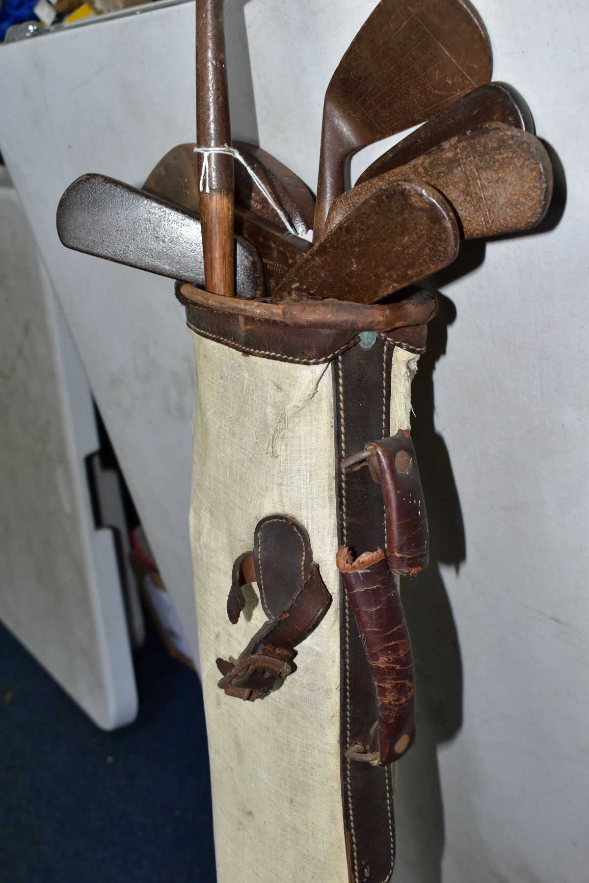 A VINTAGE CANVAS AND LEATHER TRIMMED GOLF BAG CONTAINING ELEVEN WOODEN SHAFTED GOLF CLUBS, brands - Image 3 of 7