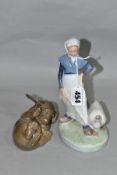 TWO ROYAL COPENHAGEN FIGURES, comprising Goose Girl No 067, height 18.5cm and Dachshund Puppy No