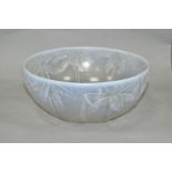 A CZECHOSLAVAKIAN OPALESCENT GLASS BOWL MOULDED WITH A BAND OF PALM TREES, bears etched facsimile