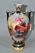 A ROYAL WORCESTER TWIN HANDLED HADLEY SHAPE VASE, hand painted with sweet peas to front and back,