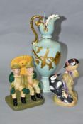A ROYAL WORCESTER 'PIED WOODPECKERS' FIGURE GROUP, model no 3363, height 11.5cm, a Wade limited