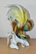 A RUDOLSTADT VOLKSTEDT KARL ENS FIGURE OF A BIRD OF PARADISE, marked to base, height 27.5cm (