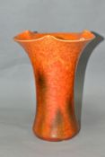 A PILKINGTONS ROYAL LANCASTRIAN WAVY AND FLARED RIM CONICAL VASE, mottled orange glaze with