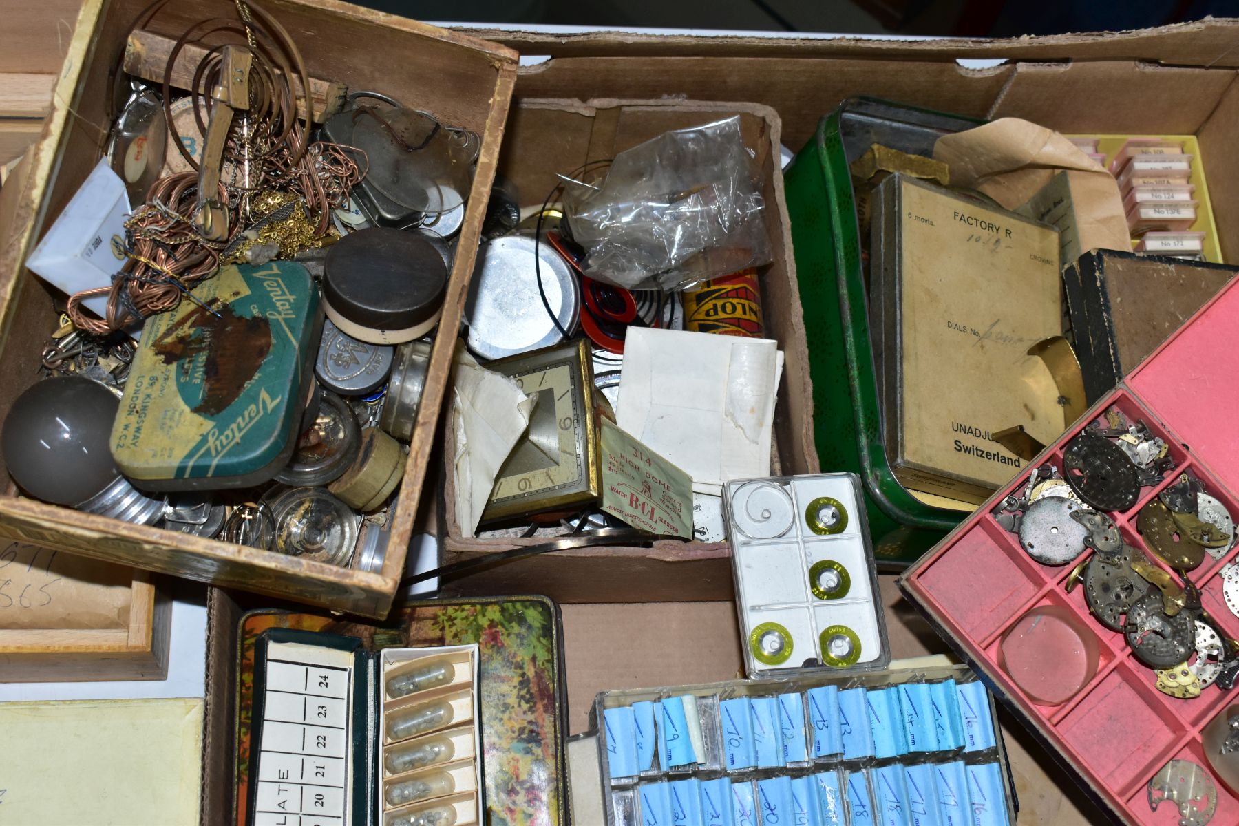 TWO BOXES OF ASSORTED WATCH MAKERS PARTS, GLASSES, COGS, SPRINGS, CROWNS, DECONSTTUCTED WATCH - Image 21 of 30