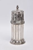 A GEORGE V SILVER SUGAR CASTER, column form, wavy openwork base, pierced cover with a ball finial,