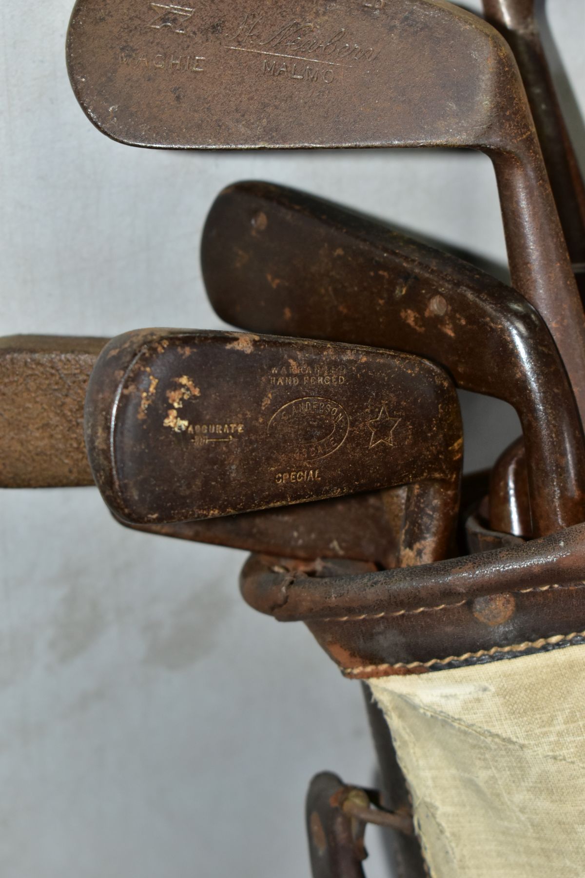 A VINTAGE CANVAS AND LEATHER TRIMMED GOLF BAG CONTAINING ELEVEN WOODEN SHAFTED GOLF CLUBS, brands - Image 7 of 7