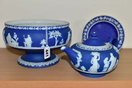 THREE PIECES OF WEDGWOOD BLUE JASPERWARE, comprising a pedestal fruit bowl, the applied decoration