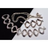 A SILVER PENDANT, BRACELET AND PENDANT NECKLACE, the bracelet of an openwork textured link design,