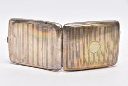 A SILVER CIGARETTE CASE, of a rectangular form, engine turn design with a vacant cartouche, push