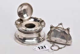 A SILVER INK WELL AND A SILVER PURSE, the ink well of a circular design, wavy rim, hallmarked '