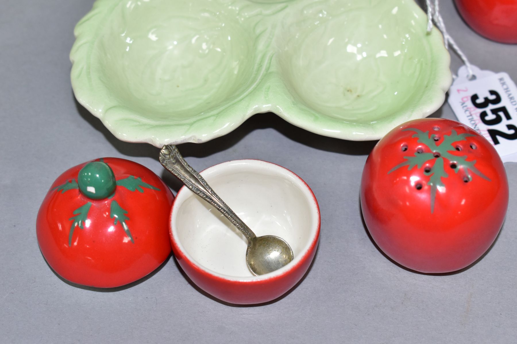 A CARLTON WARE AUSTRALIAN DESIGN CRUET IN THE FORM OF THREE TOMATOES ON A LEAF MOULDED STAND, salt - Image 4 of 6
