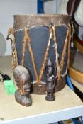 AN AFRICAN ANIMAL SKIN AND METAL DRUM, height 37cm x diameter 28cm, together with a carved