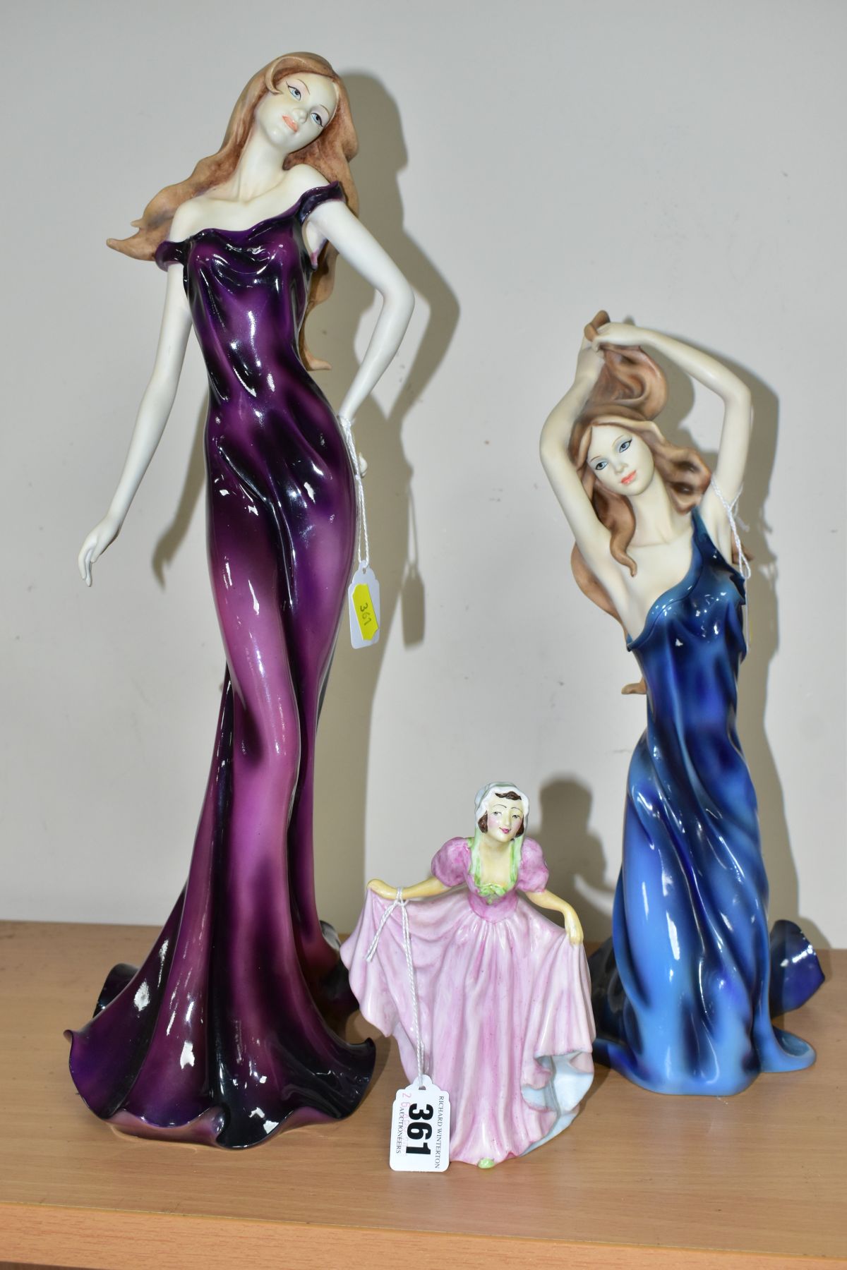 A 1940 BONE CHINA LADY FIGURE TITLED ELAINE AND TWO FRANKLIN MINT 'SOPHISTICATION' RESIN MODELS, the