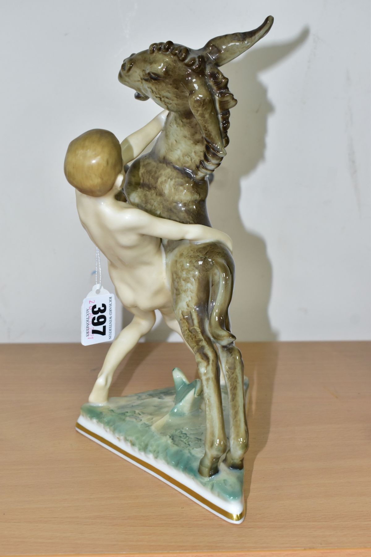 A 20TH CENTURY SELB HUTSCHENREUTHER FIGURE GROUP OF A DONKEY FOAL AND A SPRITE, on a triangular base - Bild 3 aus 9