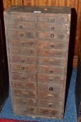 A LATE 19TH CENTURY PINE BANK OF TWENTY FOUR DRAWS, most draws with dividers, most fitted with