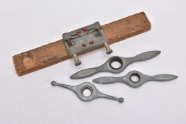 THREE ROLEX OYSTER CASE BACK KEYS AND A ROLEX CASE VICE, to include a 20.2mm, a 22.5mm/26.5mm, and a