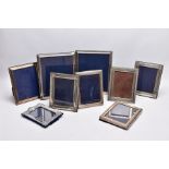 A SELECTION OF SILVER LINED PHOTO FRAMES, to include nine frames in total, of various designs and